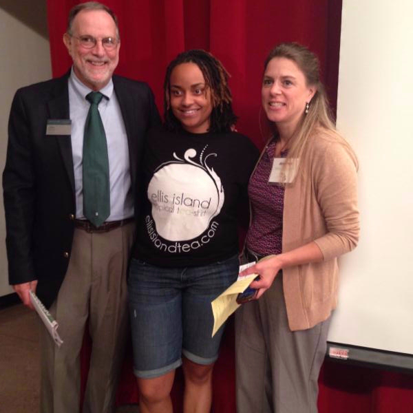 John Melcher and Jennifer Bruen standing next to the Keynote speaker, Nailah Brown