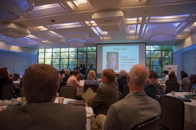 2015 REI Summit attendees watching a presentation